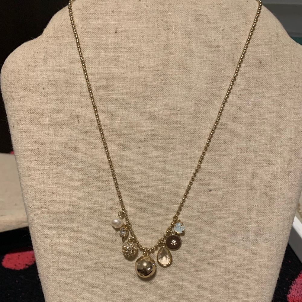 Charm necklace in gold